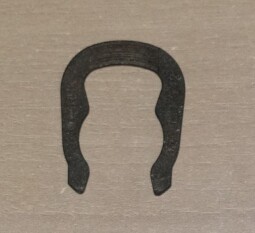 Pružina,pojistka pro teplotní čidlo vody.