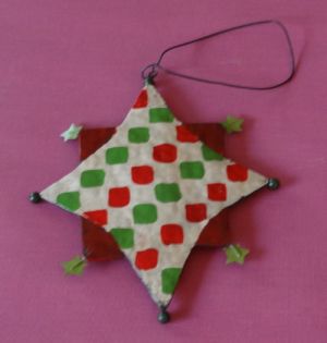 Vánoční dekorace - hvězda, materiál plech.